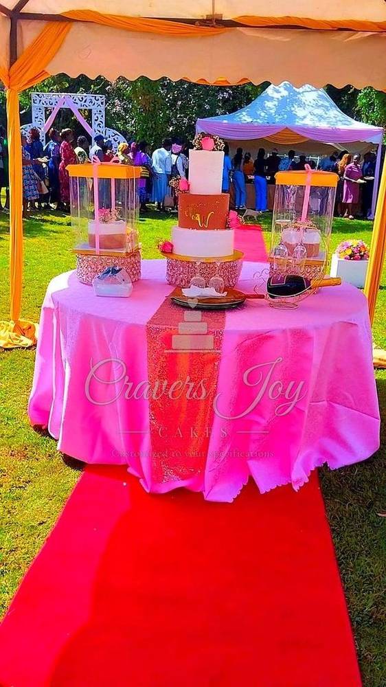 Pink cake table on the red carpet by Cravers Joy Cakes, Juja