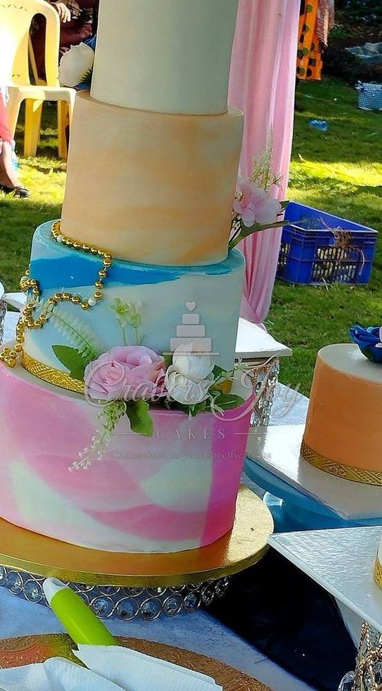 Pastel marble 4-tier celebration cake by Cravers Joy Cakes, Juja