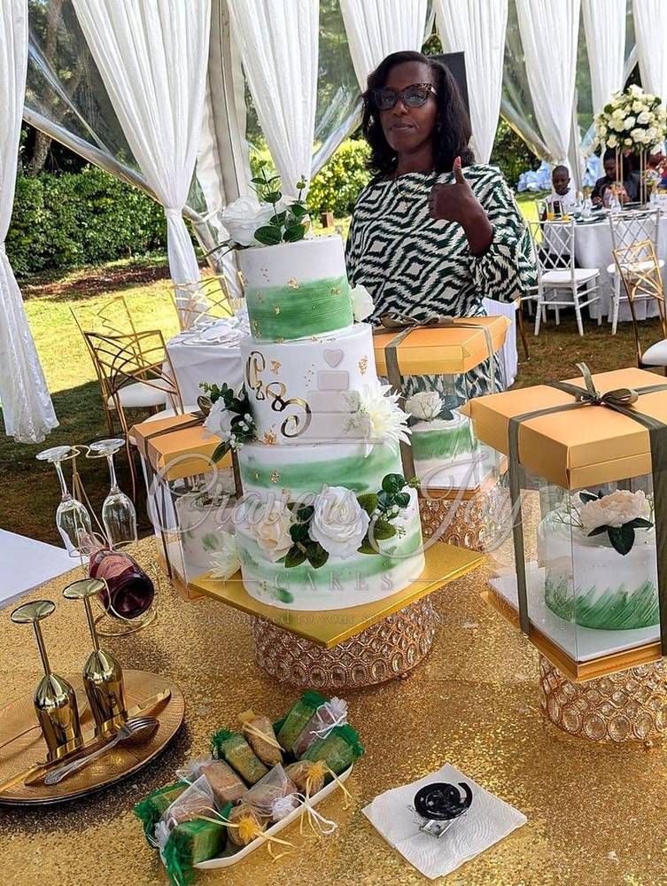 Green & white tiered wedding cake by Cravers Joy Cakes, Juja