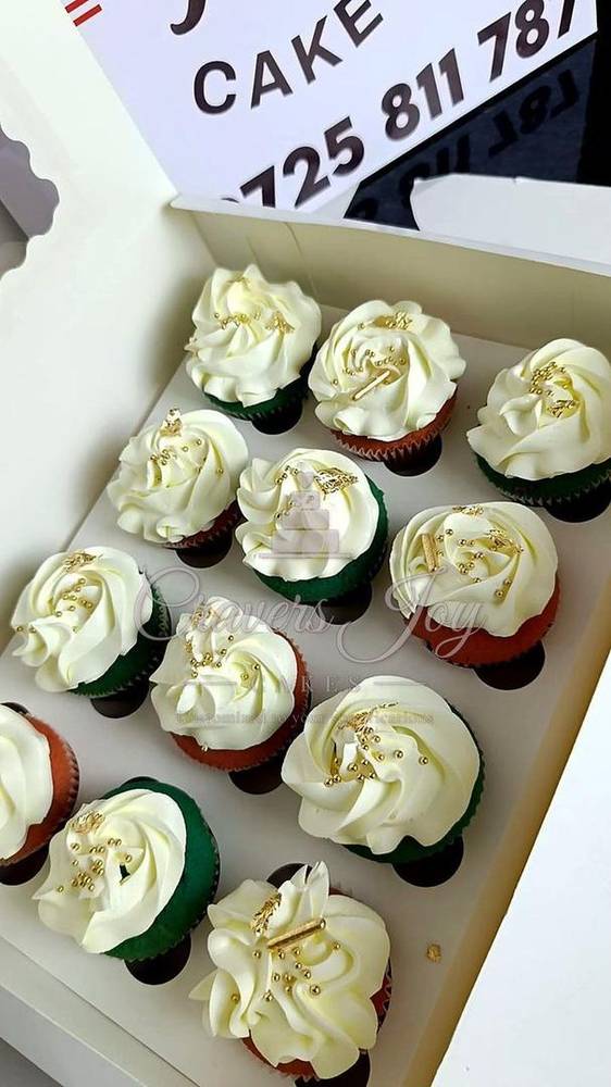 A dozen swirl-frosted cupcakes by Cravers Joy Cakes, Juja