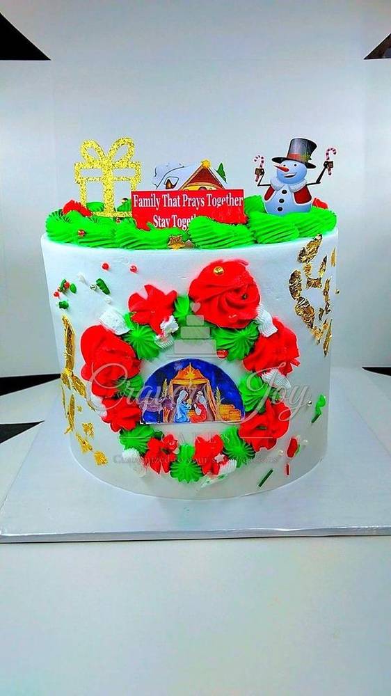 Christmas cake with red roses by Cravers Joy Cakes, Juja