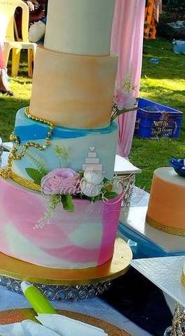 Pastel marble 4-tier celebration cake by Cravers Joy Cakes