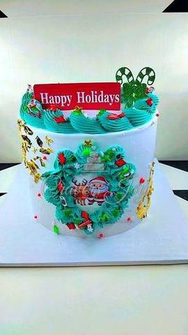 Happy Holidays wreath cake by Cravers Joy Cakes